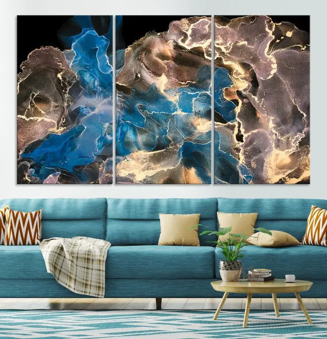 The Blue Golden Marble Wall Art Abstract Canvas Print, ready to hang, enhances the elegance of the modern living room.