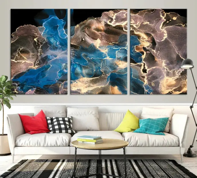 The Blue Golden Marble Wall Art Abstract Canvas Print, ready to hang, enhances the elegance of the modern living room.