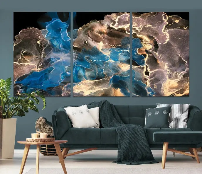 The Blue Golden Marble Wall Art Abstract Canvas Print, ready to hang, enhances the elegance of the modern living room.