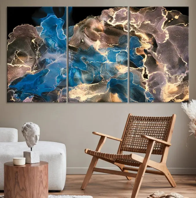 The Blue Golden Marble Wall Art Abstract Canvas Print, ready to hang, enhances the elegance of the modern living room.