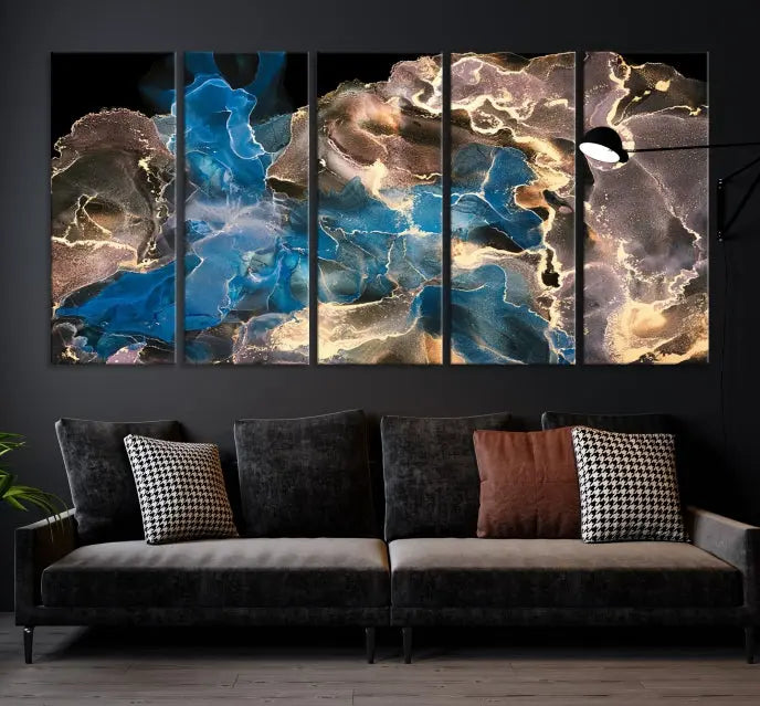 The Blue Golden Marble Wall Art Abstract Canvas Print, ready to hang, enhances the elegance of the modern living room.