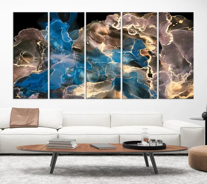 The Blue Golden Marble Wall Art Abstract Canvas Print, ready to hang, enhances the elegance of the modern living room.