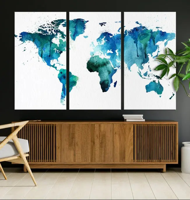 The Blue Green Dominated World Map Canvas Wall Art features a triptych design in watercolor shades of blue and green. It's printed on museum-quality canvas with a UV-protective coating and is ready to hang, bringing an artistic flair to any space.