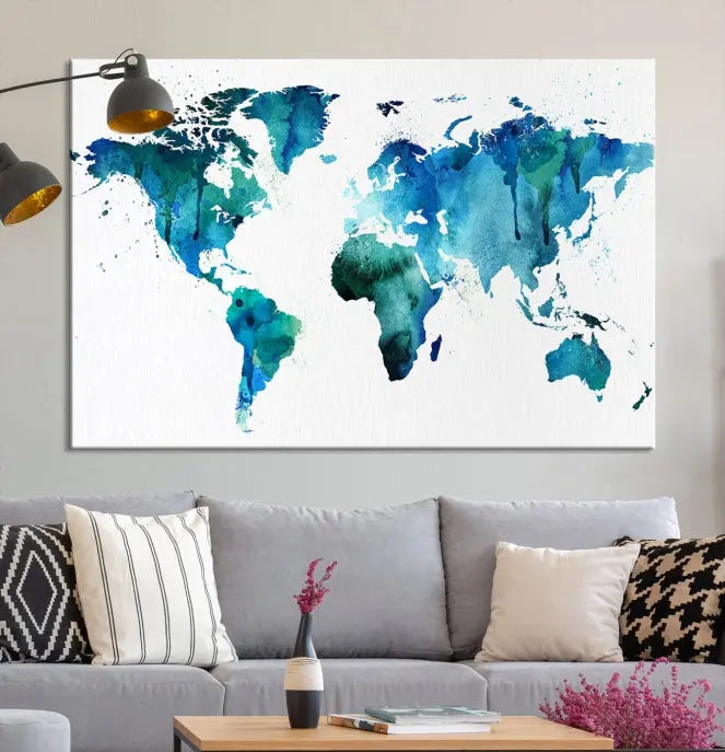 The Blue Green Dominated World Map Canvas Wall Art features a triptych design in watercolor shades of blue and green. It's printed on museum-quality canvas with a UV-protective coating and is ready to hang, bringing an artistic flair to any space.