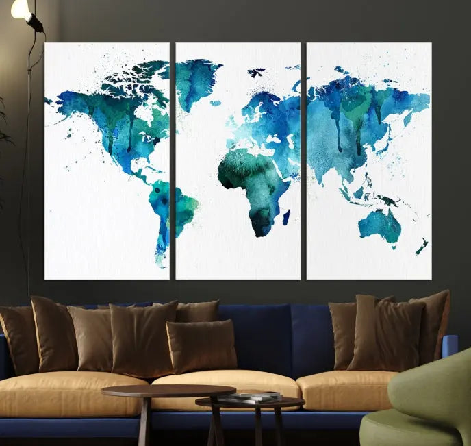 The Blue Green Dominated World Map Canvas Wall Art features a triptych design in watercolor shades of blue and green. It's printed on museum-quality canvas with a UV-protective coating and is ready to hang, bringing an artistic flair to any space.