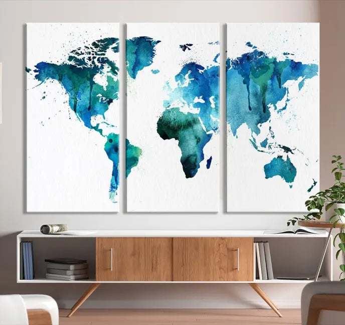 The Blue Green Dominated World Map Canvas Wall Art features a triptych design in watercolor shades of blue and green. It's printed on museum-quality canvas with a UV-protective coating and is ready to hang, bringing an artistic flair to any space.