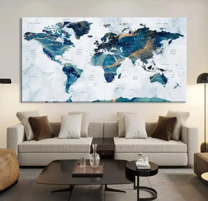 The modern living room showcases the Blue Green World Map Wall Art Canvas Print, a captivating three-panel artwork crafted on museum-quality canvases with a UV-protective coating.