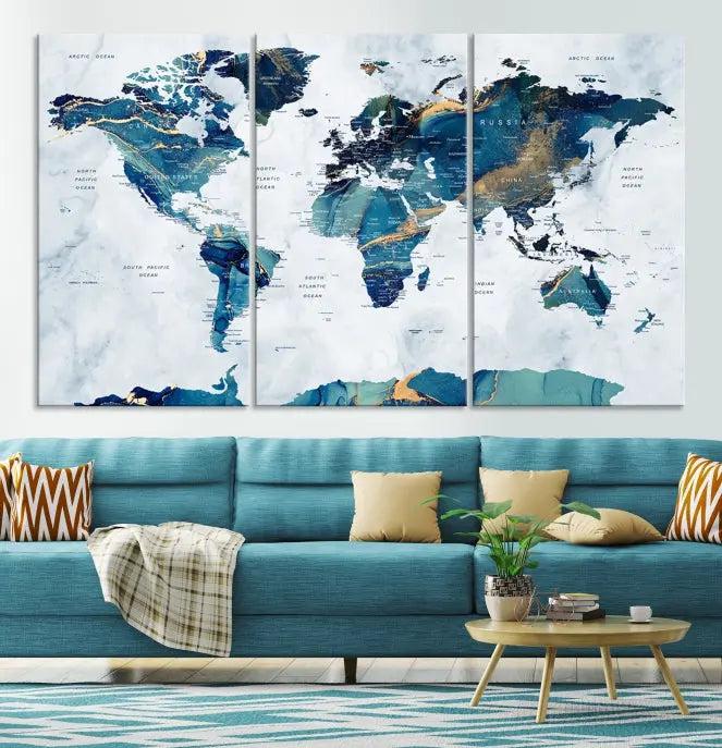 The modern living room showcases the Blue Green World Map Wall Art Canvas Print, a captivating three-panel artwork crafted on museum-quality canvases with a UV-protective coating.