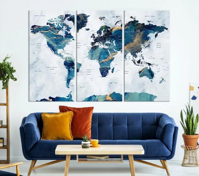 The modern living room showcases the Blue Green World Map Wall Art Canvas Print, a captivating three-panel artwork crafted on museum-quality canvases with a UV-protective coating.