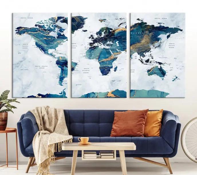 The modern living room showcases the Blue Green World Map Wall Art Canvas Print, a captivating three-panel artwork crafted on museum-quality canvases with a UV-protective coating.