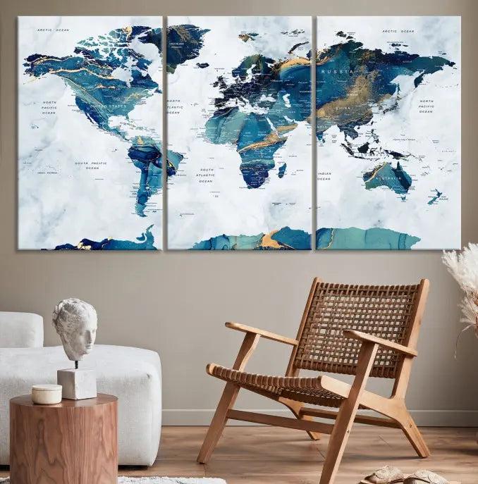 The modern living room showcases the Blue Green World Map Wall Art Canvas Print, a captivating three-panel artwork crafted on museum-quality canvases with a UV-protective coating.