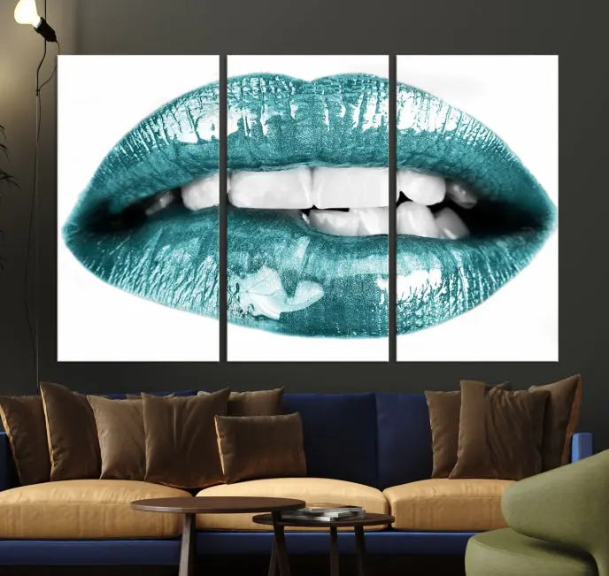 The "Blue Lips Wall Art Canvas Print," a contemporary three-panel piece, serves as a striking centerpiece in the room.