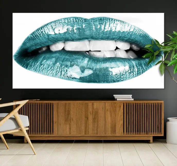 The "Blue Lips Wall Art Canvas Print," a contemporary three-panel piece, serves as a striking centerpiece in the room.