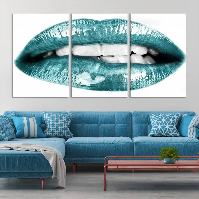 The "Blue Lips Wall Art Canvas Print," a contemporary three-panel piece, serves as a striking centerpiece in the room.