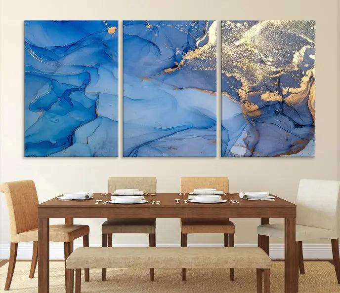 The "Blue Marble Effect Wall Art Abstract Canvas Wall Art Print" showcases an exquisite blend of blue and gold hues. This hand-assembled piece is crafted on museum-quality canvas and includes a UV-protective coating to preserve its vibrant colors over time.