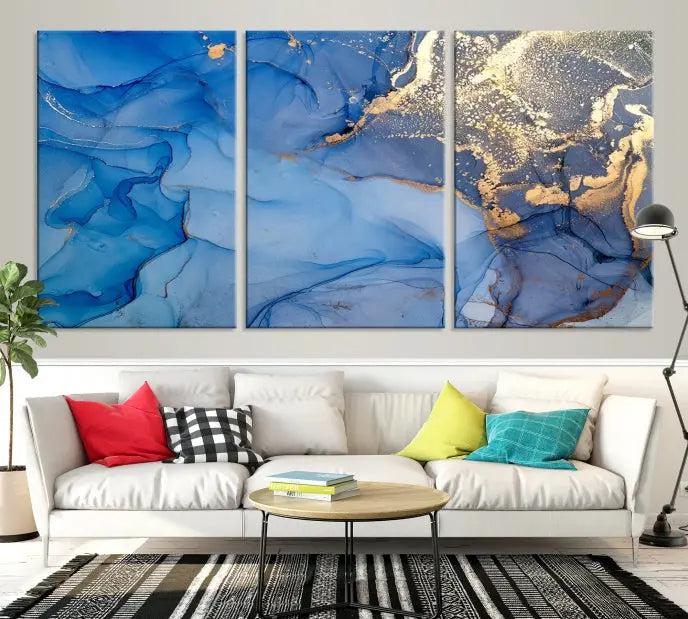 The "Blue Marble Effect Wall Art Abstract Canvas Wall Art Print" showcases an exquisite blend of blue and gold hues. This hand-assembled piece is crafted on museum-quality canvas and includes a UV-protective coating to preserve its vibrant colors over time.