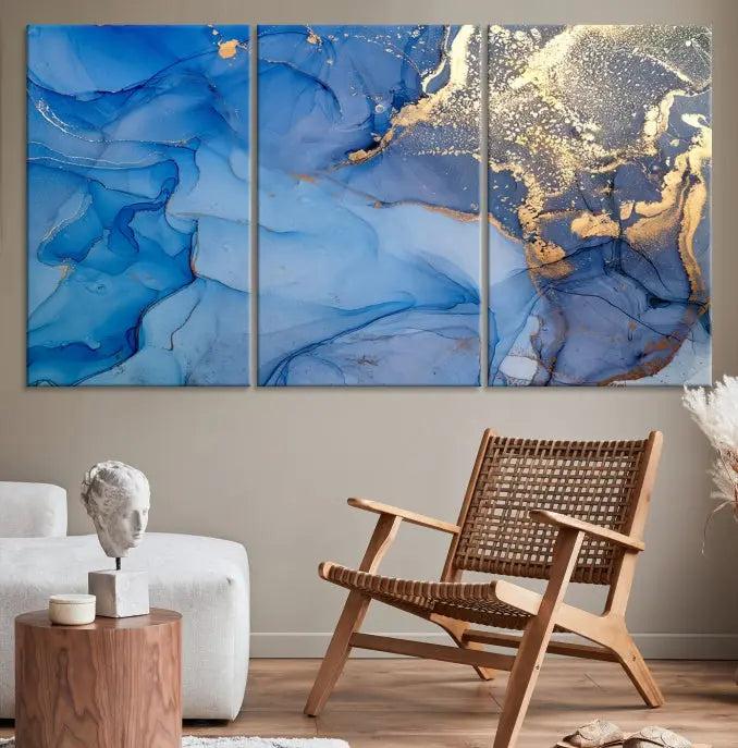 The "Blue Marble Effect Wall Art Abstract Canvas Wall Art Print" showcases an exquisite blend of blue and gold hues. This hand-assembled piece is crafted on museum-quality canvas and includes a UV-protective coating to preserve its vibrant colors over time.