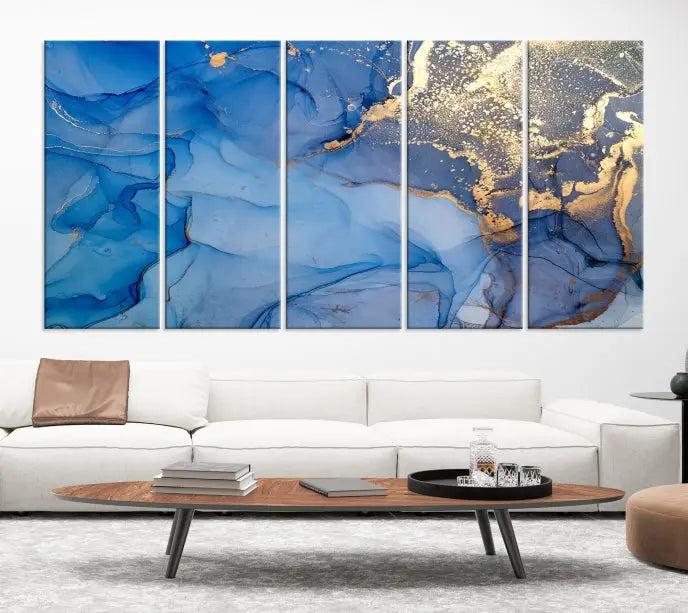 The "Blue Marble Effect Wall Art Abstract Canvas Wall Art Print" showcases an exquisite blend of blue and gold hues. This hand-assembled piece is crafted on museum-quality canvas and includes a UV-protective coating to preserve its vibrant colors over time.