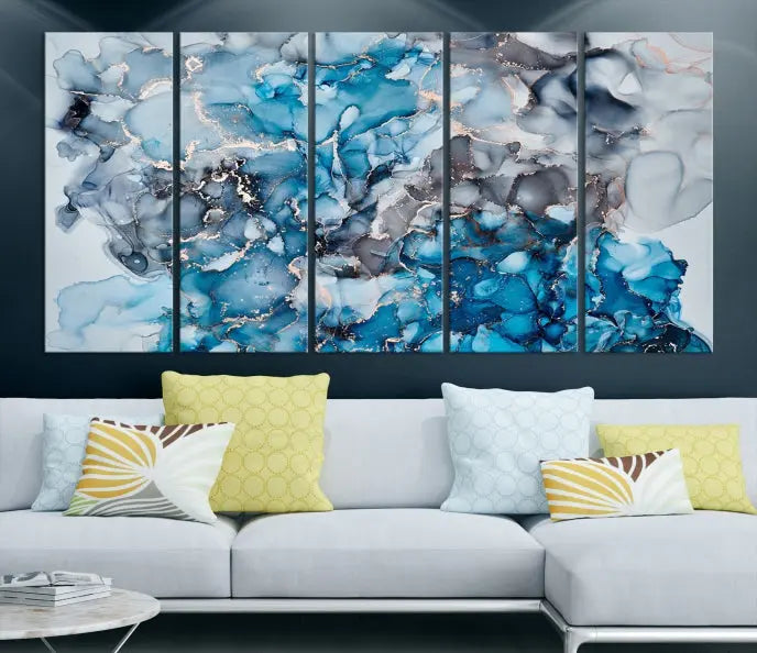 The "Blue Marble Fluid Effect Wall Art Abstract Canvas Wall Art Print" is a triptych that showcases captivating blue and gray abstract patterns on museum-quality canvas. It is enhanced with a UV-protective coating to maintain its vivid colors over time.