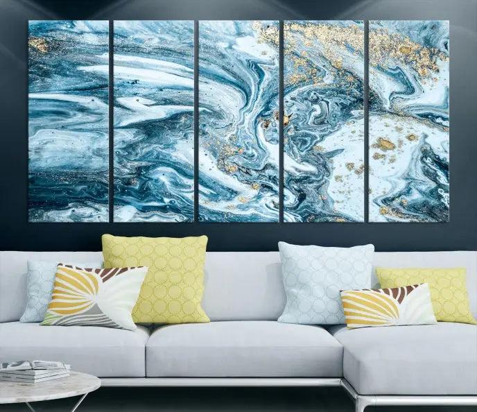 A triptych piece titled "Blue Marble Fluid Effect Wall Art Canvas Wall Art Print," featuring an abstract design in blue and gold on museum-quality canvas with a UV-protective coating, graces the wall.