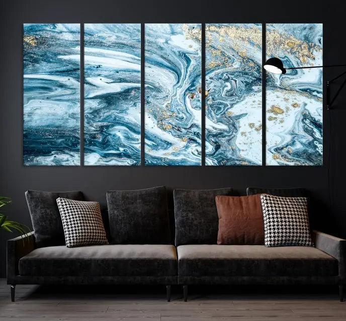 A triptych piece titled "Blue Marble Fluid Effect Wall Art Canvas Wall Art Print," featuring an abstract design in blue and gold on museum-quality canvas with a UV-protective coating, graces the wall.