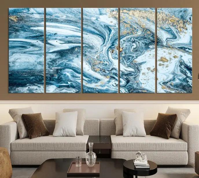 A triptych piece titled "Blue Marble Fluid Effect Wall Art Canvas Wall Art Print," featuring an abstract design in blue and gold on museum-quality canvas with a UV-protective coating, graces the wall.