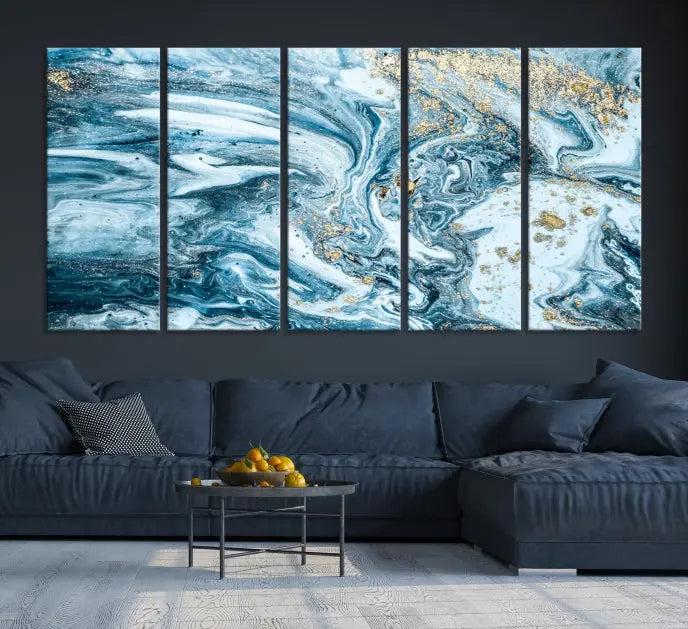 A triptych piece titled "Blue Marble Fluid Effect Wall Art Canvas Wall Art Print," featuring an abstract design in blue and gold on museum-quality canvas with a UV-protective coating, graces the wall.