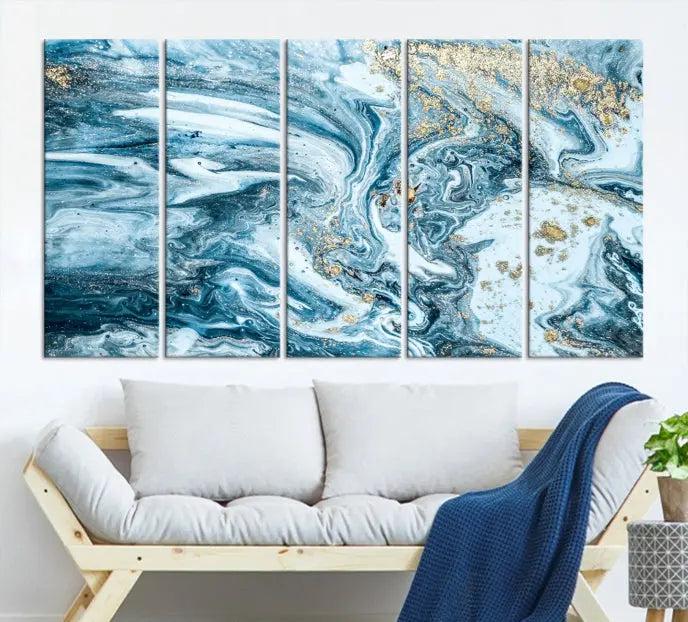 A triptych piece titled "Blue Marble Fluid Effect Wall Art Canvas Wall Art Print," featuring an abstract design in blue and gold on museum-quality canvas with a UV-protective coating, graces the wall.