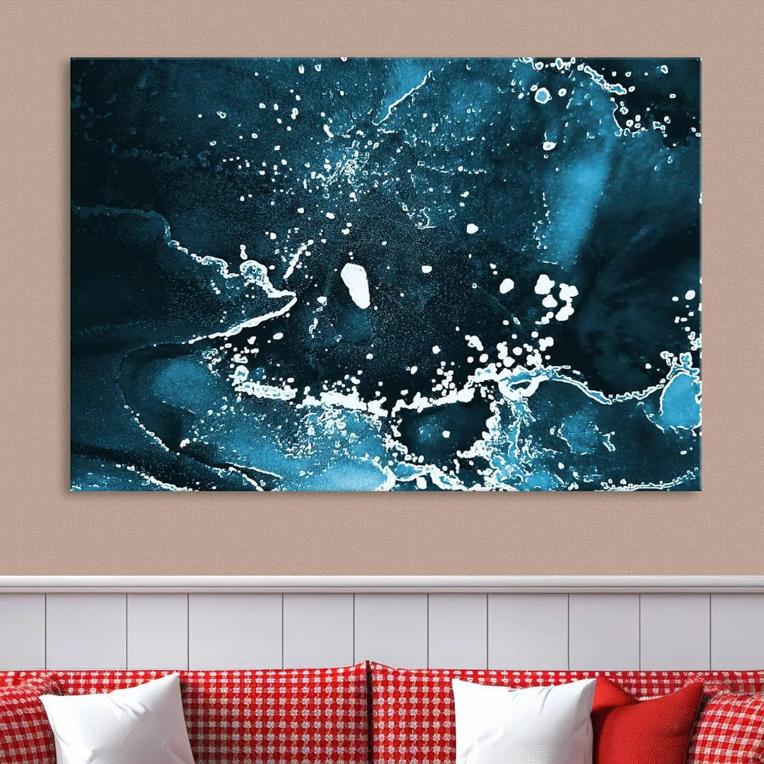 The Blue Marble Ink Splash Effect Wall Art Abstract Canvas Wall Art Print features a gallery-wrapped finish on museum-quality canvas with UV-protective coating, hanging elegantly in the room.