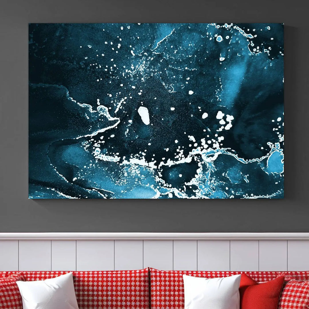 The Blue Marble Ink Splash Effect Wall Art Abstract Canvas Wall Art Print features a gallery-wrapped finish on museum-quality canvas with UV-protective coating, hanging elegantly in the room.