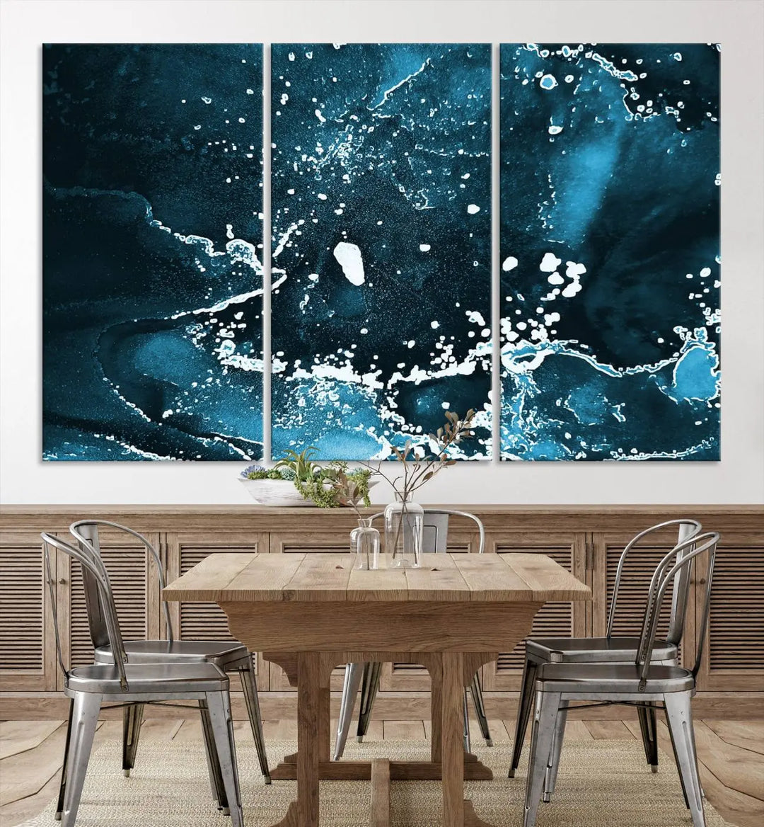 The Blue Marble Ink Splash Effect Wall Art Abstract Canvas Wall Art Print features a gallery-wrapped finish on museum-quality canvas with UV-protective coating, hanging elegantly in the room.