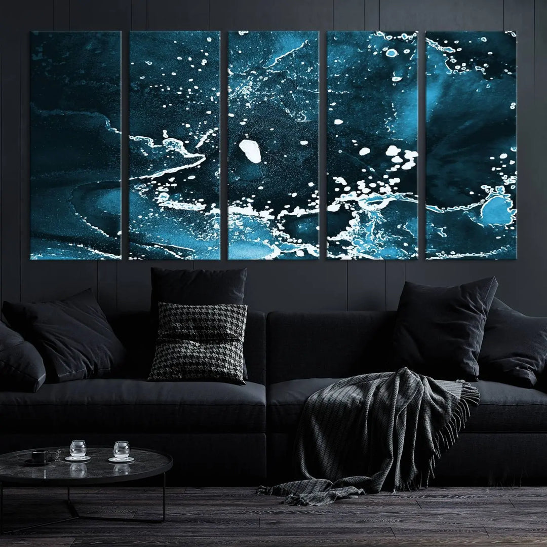 The Blue Marble Ink Splash Effect Wall Art Abstract Canvas Wall Art Print features a gallery-wrapped finish on museum-quality canvas with UV-protective coating, hanging elegantly in the room.