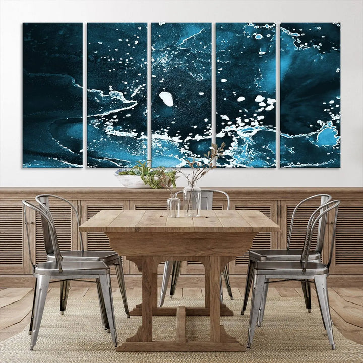 The Blue Marble Ink Splash Effect Wall Art Abstract Canvas Wall Art Print features a gallery-wrapped finish on museum-quality canvas with UV-protective coating, hanging elegantly in the room.