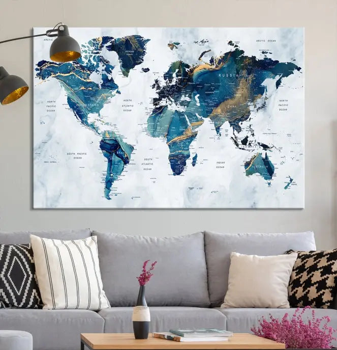 The Blue Marble Style World Map Wall Art Canvas Print, featuring three panels in blue tones, is displayed prominently.