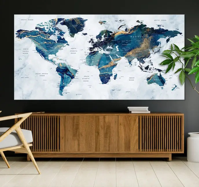 The Blue Marble Style World Map Wall Art Canvas Print, featuring three panels in blue tones, is displayed prominently.