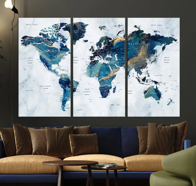 The Blue Marble Style World Map Wall Art Canvas Print, featuring three panels in blue tones, is displayed prominently.