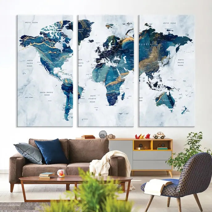 The Blue Marble Style World Map Wall Art Canvas Print, featuring three panels in blue tones, is displayed prominently.