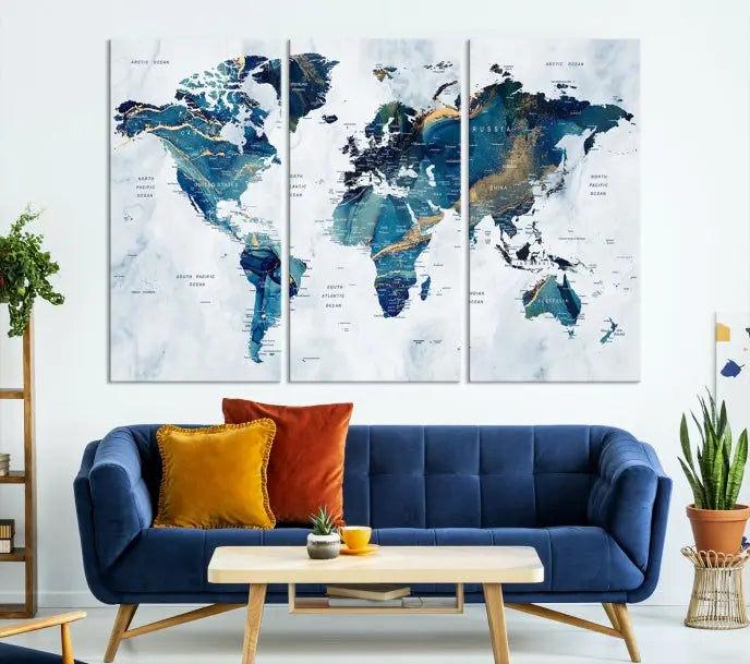 The Blue Marble Style World Map Wall Art Canvas Print, featuring three panels in blue tones, is displayed prominently.