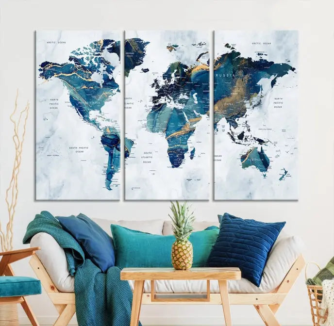 The Blue Marble Style World Map Wall Art Canvas Print, featuring three panels in blue tones, is displayed prominently.