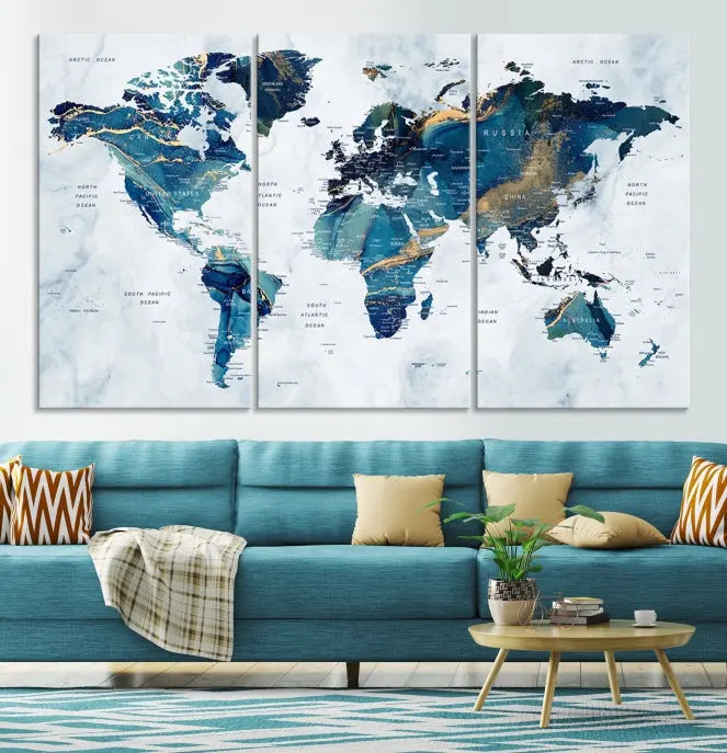 The Blue Marble Style World Map Wall Art Canvas Print, featuring three panels in blue tones, is displayed prominently.