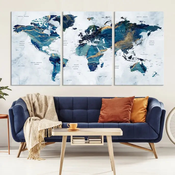 The Blue Marble Style World Map Wall Art Canvas Print, featuring three panels in blue tones, is displayed prominently.