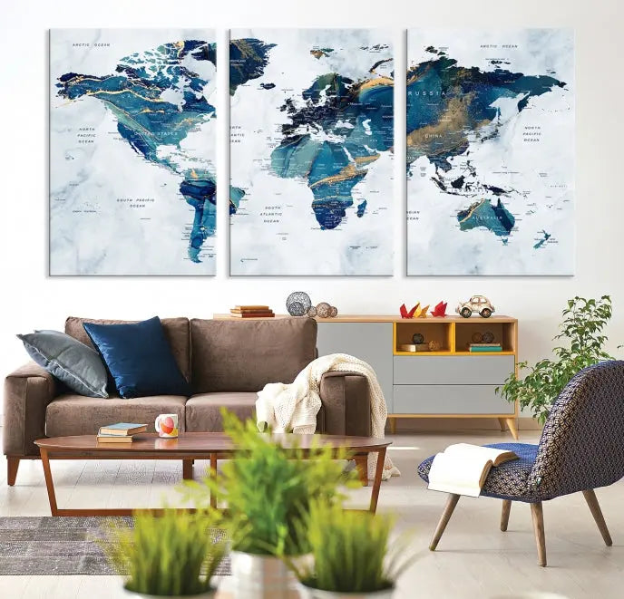 The Blue Marble Style World Map Wall Art Canvas Print, featuring three panels in blue tones, is displayed prominently.