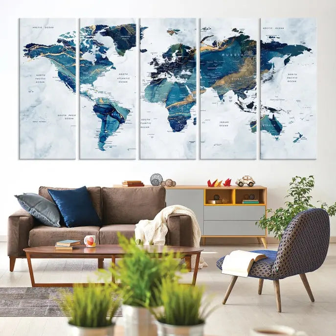 The Blue Marble Style World Map Wall Art Canvas Print, featuring three panels in blue tones, is displayed prominently.