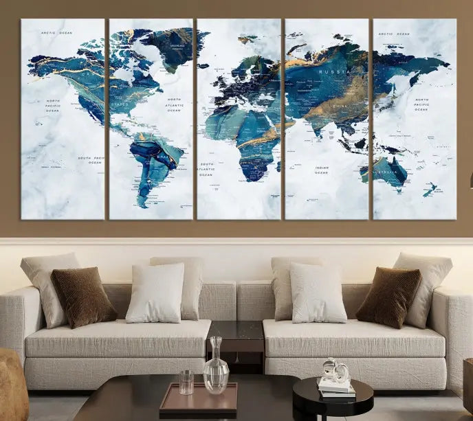 The Blue Marble Style World Map Wall Art Canvas Print, featuring three panels in blue tones, is displayed prominently.