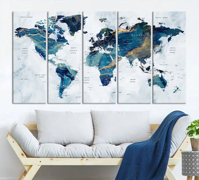 The Blue Marble Style World Map Wall Art Canvas Print, featuring three panels in blue tones, is displayed prominently.