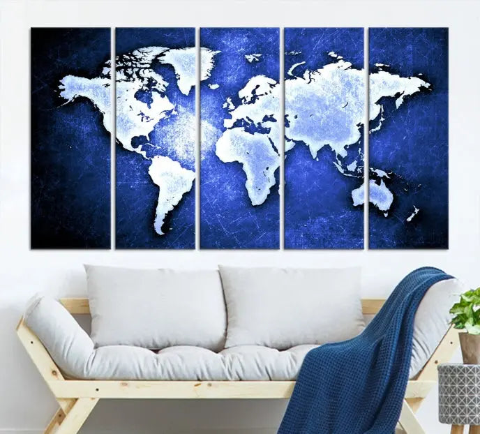 The living room features the Blue Metallic World Map Wall Art Canvas Print on a blue background, showcasing museum-quality canvases with a UV-protective coating, enhancing the modern decor.