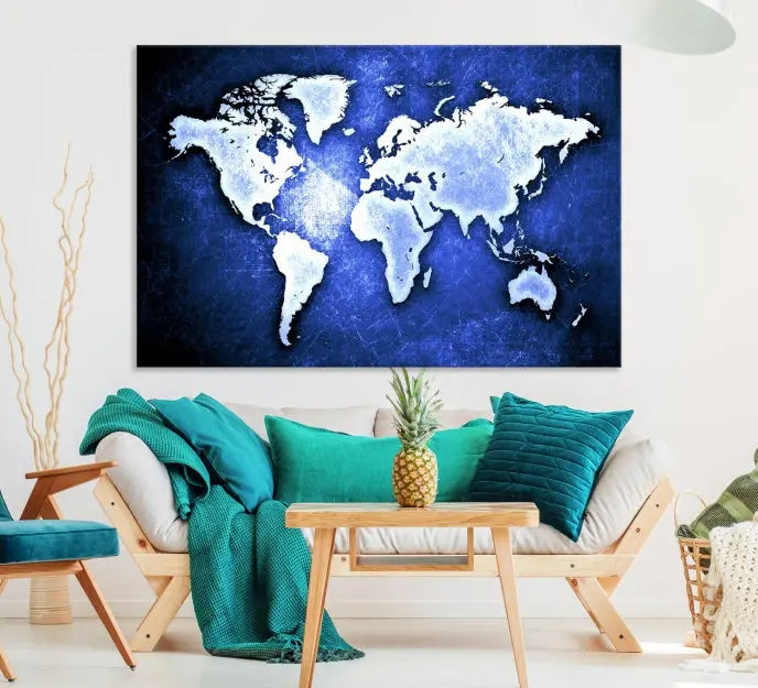 The living room features the Blue Metallic World Map Wall Art Canvas Print on a blue background, showcasing museum-quality canvases with a UV-protective coating, enhancing the modern decor.