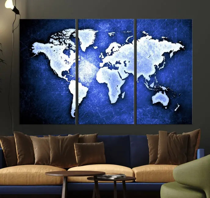 The living room features the Blue Metallic World Map Wall Art Canvas Print on a blue background, showcasing museum-quality canvases with a UV-protective coating, enhancing the modern decor.