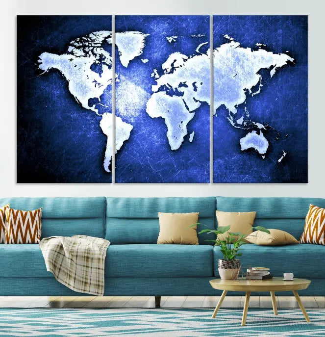 The living room features the Blue Metallic World Map Wall Art Canvas Print on a blue background, showcasing museum-quality canvases with a UV-protective coating, enhancing the modern decor.