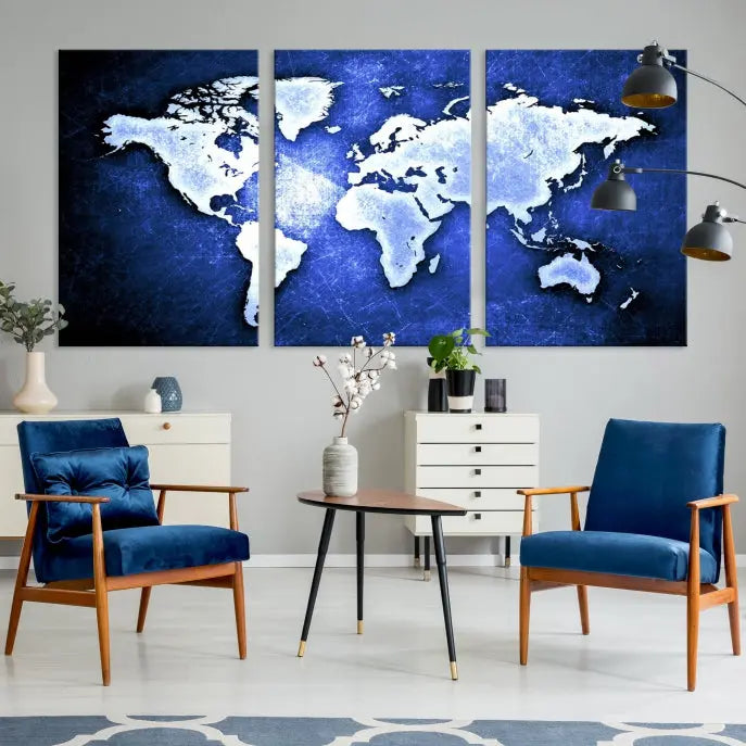 The living room features the Blue Metallic World Map Wall Art Canvas Print on a blue background, showcasing museum-quality canvases with a UV-protective coating, enhancing the modern decor.